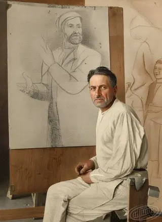 A photo of Mykhailo Boychuk in the studio with an unknown work