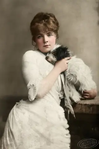 Portrait of Mariebashkirtsef with a puppy